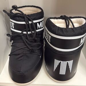 Women's Black and White Moon Boots